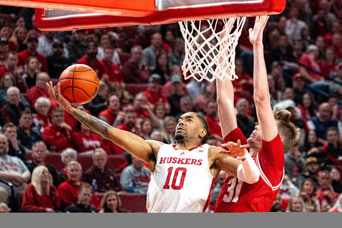 Feb 1, 2024; Lincoln, Nebraska, USA; Nebraska Cornhuskers guard Jamarques Lawrence (10) shoots the ball against Wisconsin Badgers forward Nolan Winter (31) during the first half at Pinnacle Bank Arena.